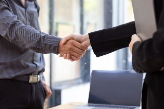 handshake-businessman-shaking-hands-with-coworker-2023-05-03-23-52-47-utc